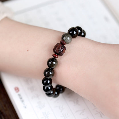 Pulsera curativa con personaje Om Mani Padme Hum Fu y obsidiana arcoíris con brillo dorado natural de Mythstone 