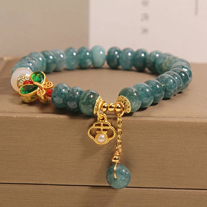 Pulsera de la abundancia con cuentas de ábaco en forma de mariposa y ágata blanca de jade Mythstone 