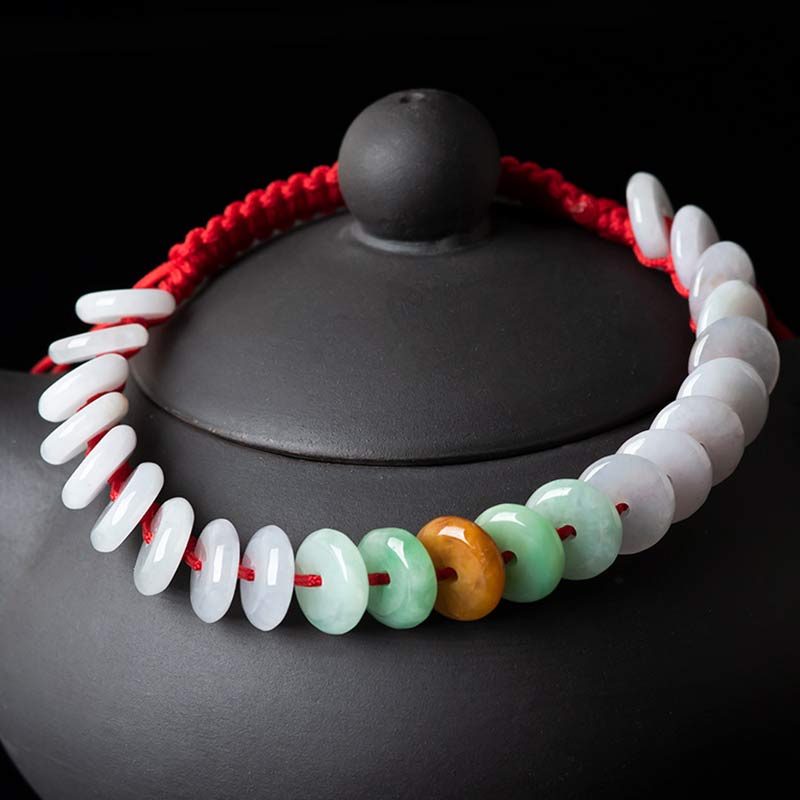 Pulsera tejida con hilo rojo de la suerte y jade redondo Mythstone