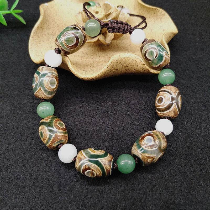 Pulsera trenzada de protección de la suerte con cuentas Dzi tibetanas de tres ojos Mythstone