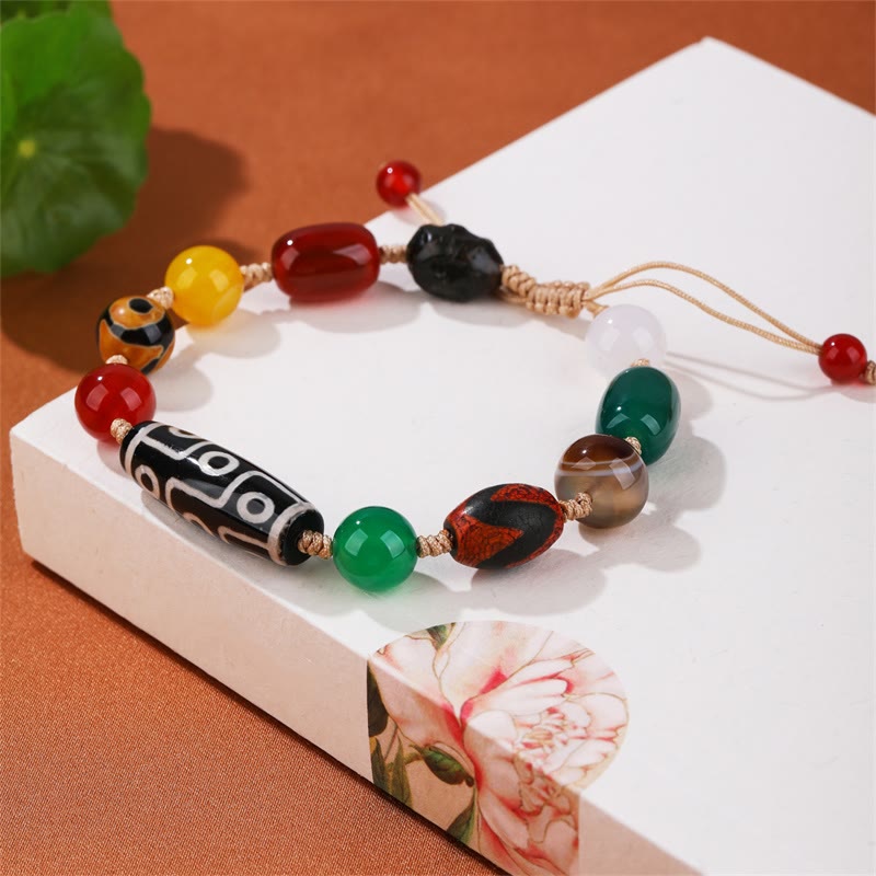 Pulsera de protección de riqueza de ágata con cuentas Dzi tibetanas de nueve ojos Mythstone 