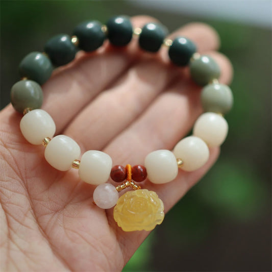 Pulsera de ámbar con semillas de bodhi y loto de la paz con degradado Mythstone