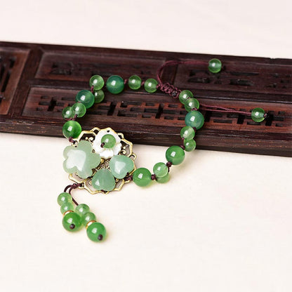 Pulsera de jade verde natural con flor colgante y suerte de Mythstone