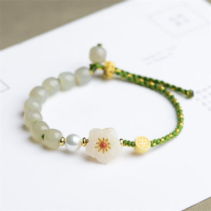 Pulsera de la suerte con jade hetiano natural y flor de durazno en plata de ley 925 Mythstone