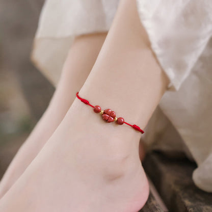 Pulsera de tobillo con trébol de cuatro hojas y cinabrio que bendice la calma