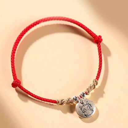 Pulsera trenzada con el signo de la suerte del año del dragón chino hecha a mano en plata de ley 999 de Mythstone 