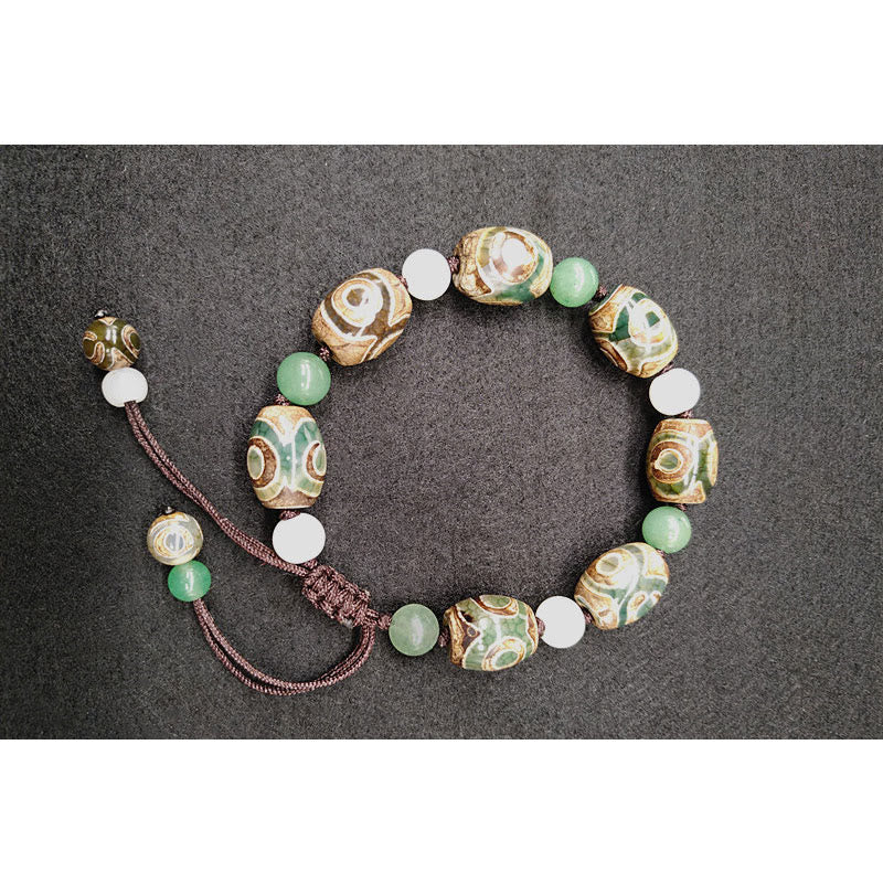 Pulsera trenzada de protección de la suerte con cuentas Dzi tibetanas de tres ojos Mythstone