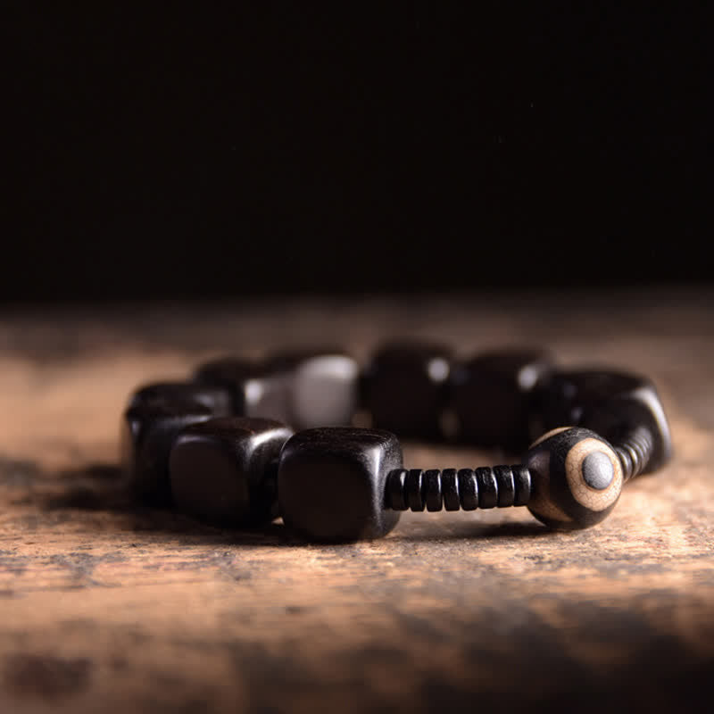 Mythstone Tibetan Ebony Wood Dzi Bead Strength Bracelet