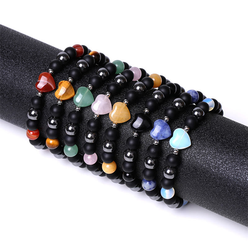 Pulsera de protección con corazón de amor y cristal de ojo de tigre y ónix negro Mythstone 