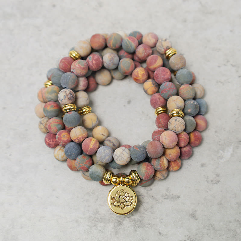 Pulsera de energía de coraje con piedra de jaspe Picasso y 108 cuentas Mala de MythStone