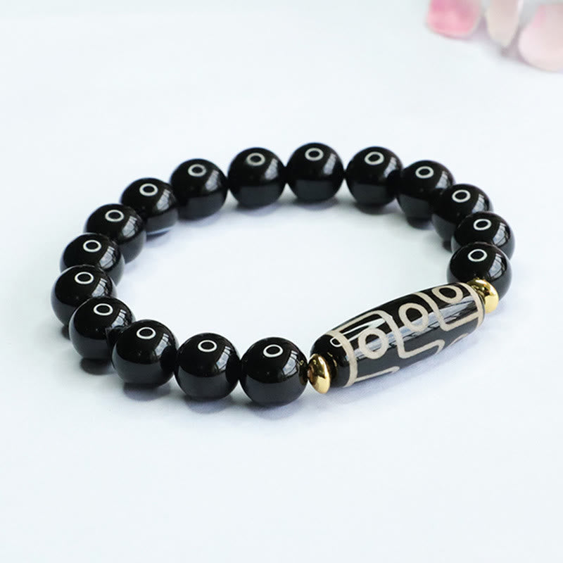 Pulsera de poder de ónix negro con cuentas tibetanas Dzi de nueve ojos Mythstone