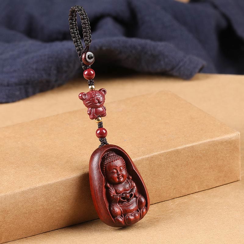 Llavero con amuleto de protección del zodíaco chino con forma de Buda de cinabrio y sándalo rojo y hoja pequeña de piedra mitológica