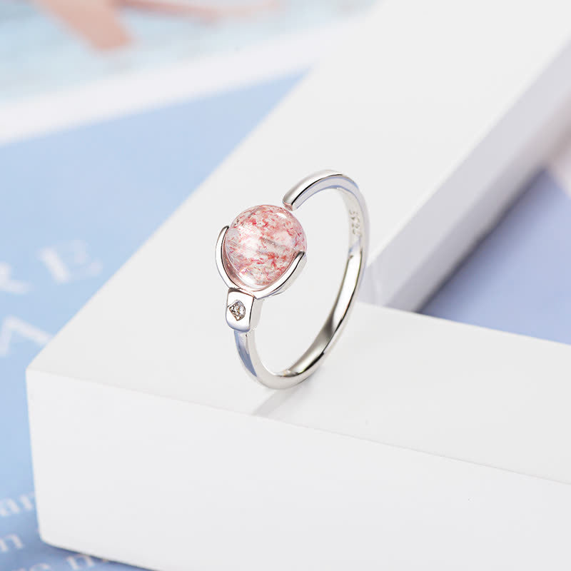 Anillo giratorio relajante de cristal rosa Mythstone 