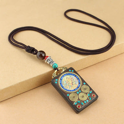 Colgante de collar de ébano con la paz y el dios de la riqueza del Thangka del Tíbet de Mythstone 