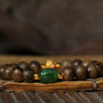 Mythstone 999 Gold Brunei Agarwood Cyan Jade Lotus Flower Peace Strength Bracelet