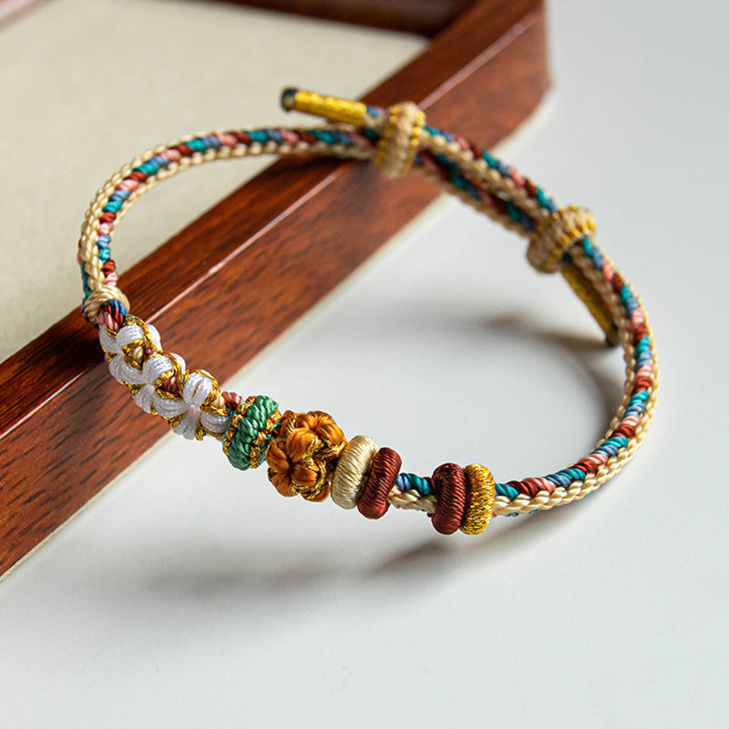 Pulsera trenzada con diseño de flor de durazno en color Dunhuang hecha a mano de Mythstone 