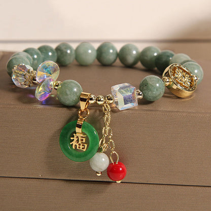 Pulsera curativa con dijes de personaje de jade y cuarzo fresa Mythstone 