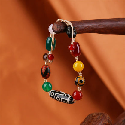 Pulsera de protección de riqueza de ágata con cuentas Dzi tibetanas de nueve ojos Mythstone 