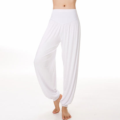 Pantalones largos tipo harén para yoga y danza de modal en color liso de Mythstone 