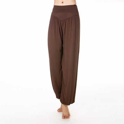 Pantalones largos tipo harén para yoga y danza de modal en color liso de Mythstone 