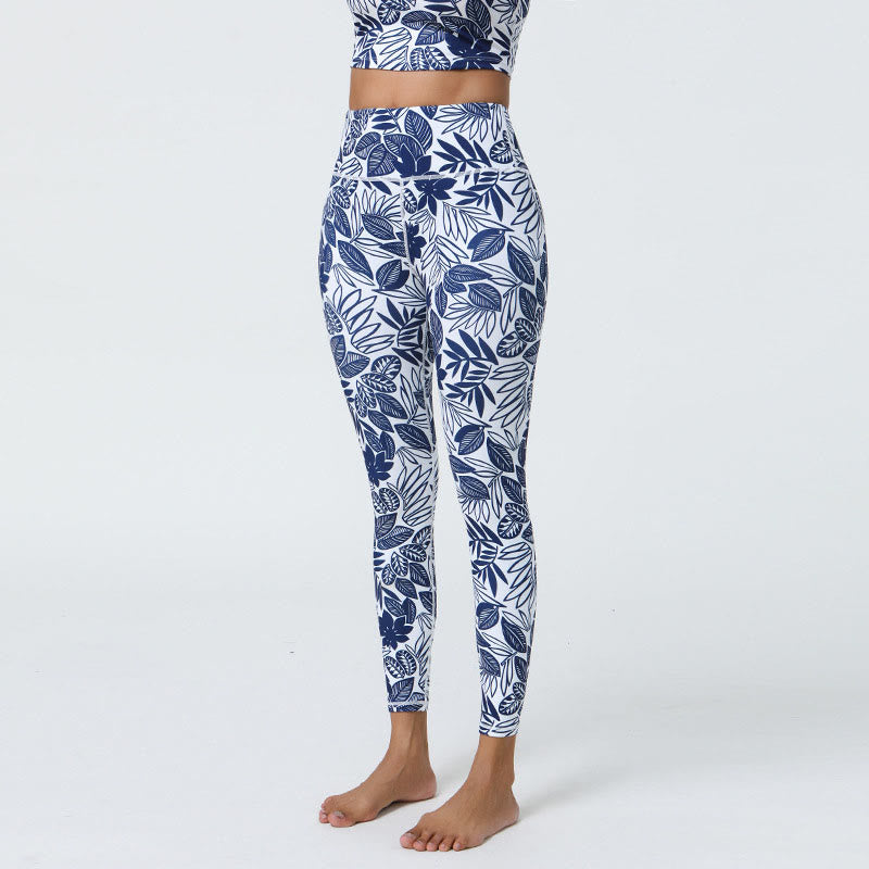 Leggings deportivos de cintura alta con estampado de flores, hojas, dientes de león y piñas de Mythstone para mujer 