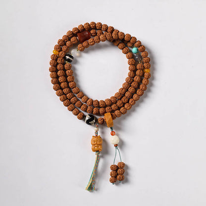 Pulsera de riqueza con amuleto de mano de Buda con cuentas Dzi de tres ojos y semilla de Bodhi de Mythstone 