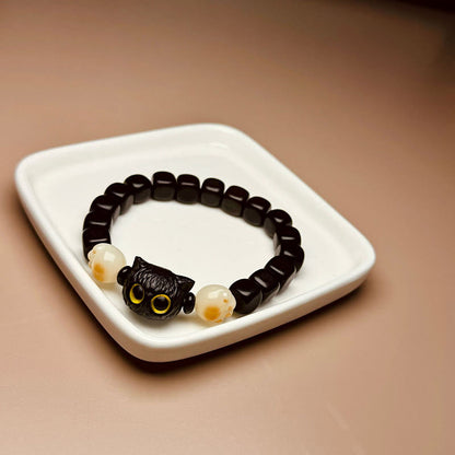 Pulsera de la paz con forma de garra y semillas de Bodhi de gato y madera de ébano Mythstone