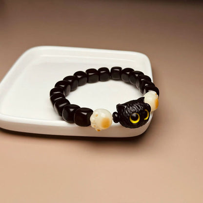 Pulsera de la paz con forma de garra y semillas de Bodhi de gato y madera de ébano Mythstone