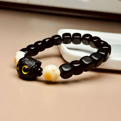 Pulsera de la paz con forma de garra y semillas de Bodhi de gato y madera de ébano Mythstone