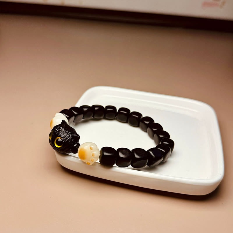 Pulsera de la paz con forma de garra y semillas de Bodhi de gato y madera de ébano Mythstone