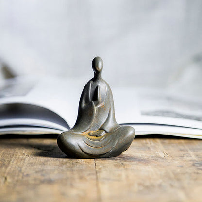 Estatua de resina fundida con óxido de hierro en polvo de Buda tibetano Mythstone para decoración de escritorio