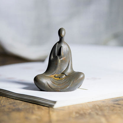 Estatua de resina fundida con óxido de hierro en polvo de Buda tibetano Mythstone para decoración de escritorio