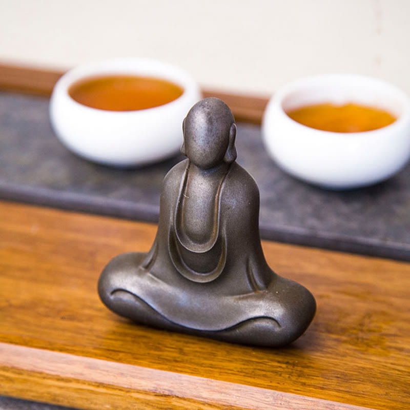 Estatua de resina fundida con óxido de hierro en polvo de Buda tibetano Mythstone para decoración de escritorio