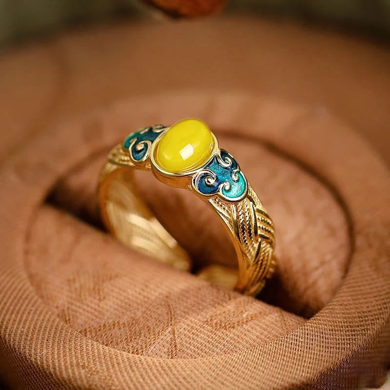 Anillo ajustable con nubes auspiciosas de cobre y ámbar de Mythstone 