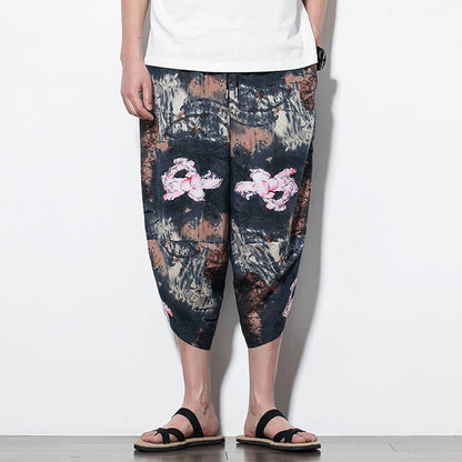 Pantalones harén largos de algodón con bolsillos y estampado de tinta de loto rosa de Mythstone para hombre 