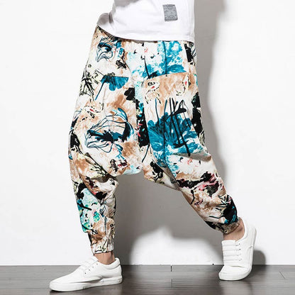 Pantalones harén largos de algodón con bolsillos para hombre con estampado de flores, hojas, marrón y azul de Mythstone 