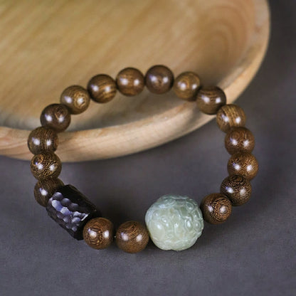 Pulsera curativa con cuentas de madera de ébano y semillas de Bodhi de sándalo y PiXiu