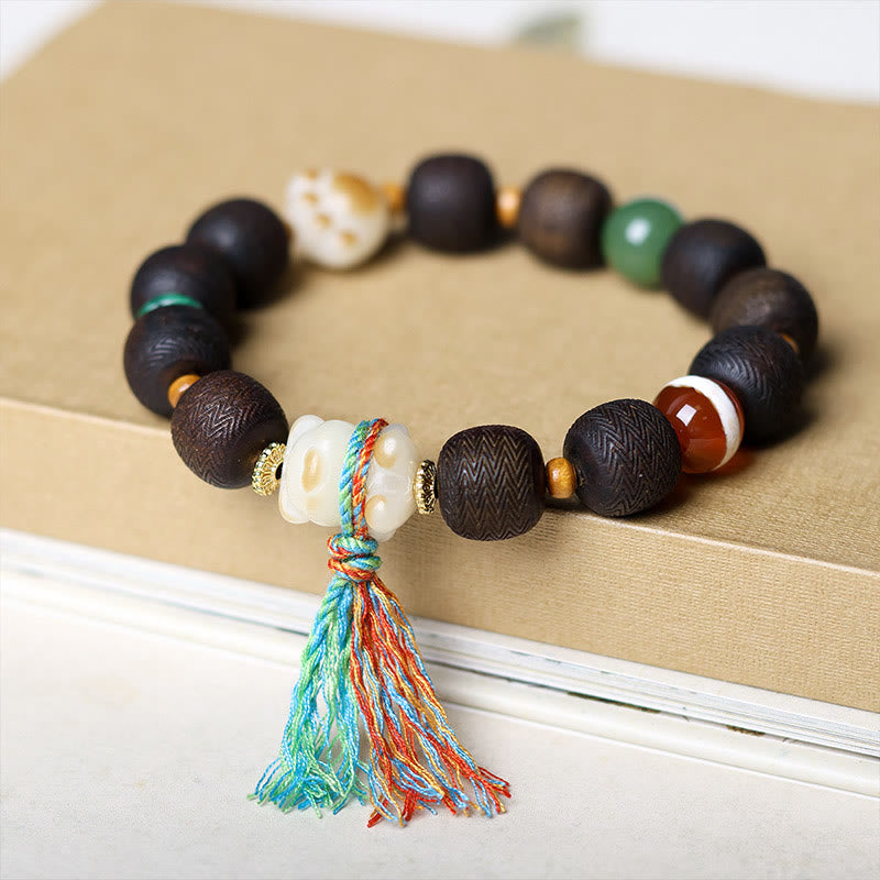 Pulsera de la paz con garra de gato y semilla de Bodhi de madera de agar Qinan verde Mythstone