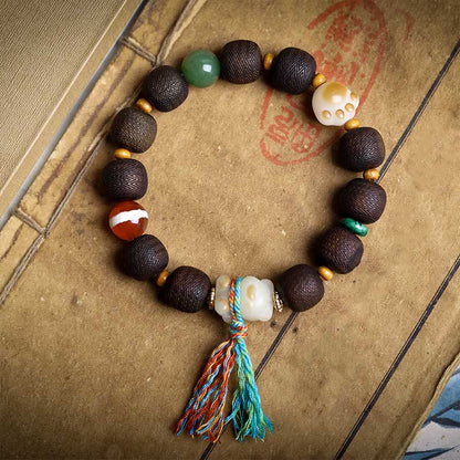 Pulsera de la paz con garra de gato y semilla de Bodhi de madera de agar Qinan verde Mythstone