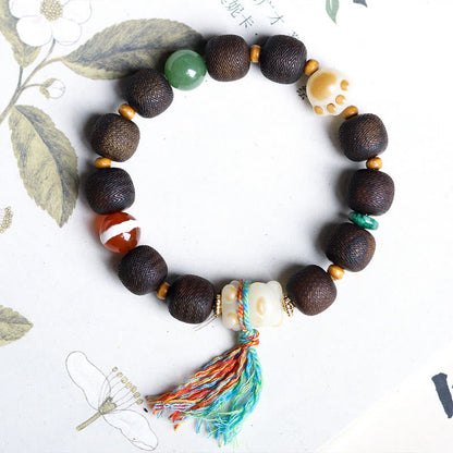 Pulsera de la paz con garra de gato y semilla de Bodhi de madera de agar Qinan verde Mythstone