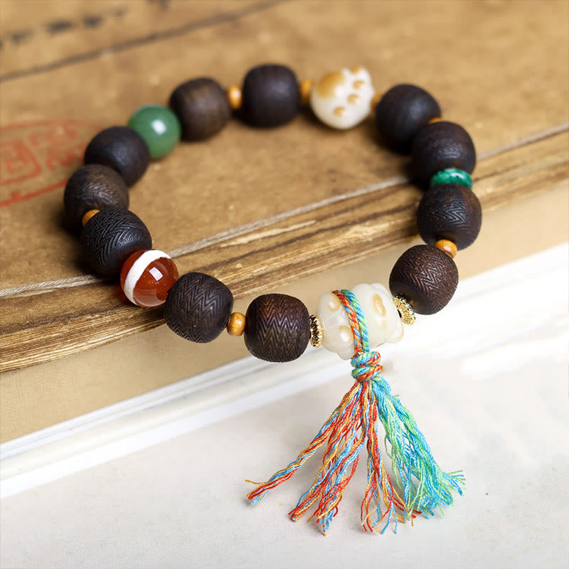 Pulsera de la paz con garra de gato y semilla de Bodhi de madera de agar Qinan verde Mythstone