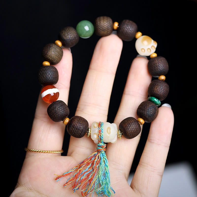 Pulsera de la paz con garra de gato y semilla de Bodhi de madera de agar Qinan verde Mythstone