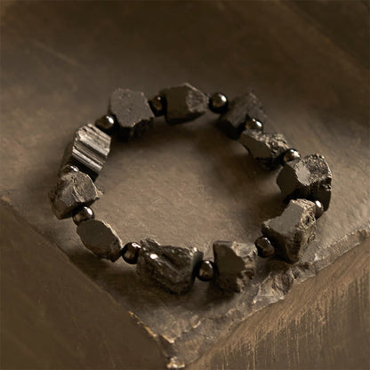 Pulsera positiva con turmalina negra y piedra irregular Mythstone 