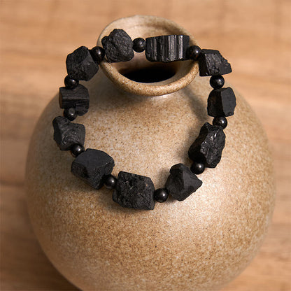 Pulsera positiva con turmalina negra y piedra irregular Mythstone 