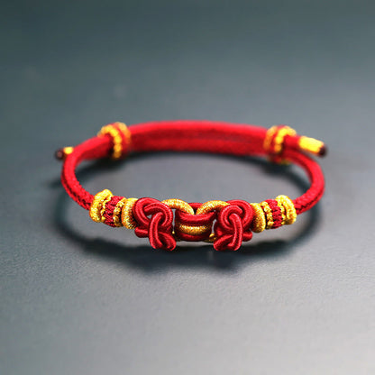 Pulsera de fuerza con nudo de silla de montar de hilo rojo Mythstone 