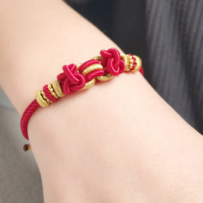 Pulsera de fuerza con nudo de silla de montar de hilo rojo Mythstone 