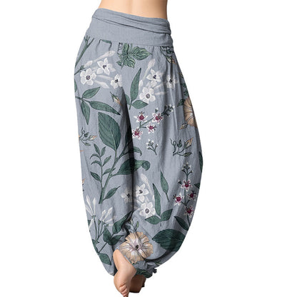 Pantalones harén con cintura elástica para mujer con estampado de flores y plantas de Mythstone 