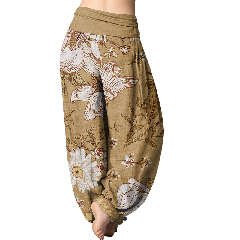 Pantalones harén con cintura elástica para mujer con estampado de flores blancas de margaritas de Mythstone 