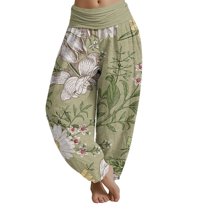 Pantalones harén con cintura elástica para mujer con estampado de flores blancas de margaritas de Mythstone 