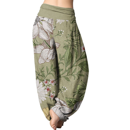 Pantalones harén con cintura elástica para mujer con estampado de flores blancas de margaritas de Mythstone 